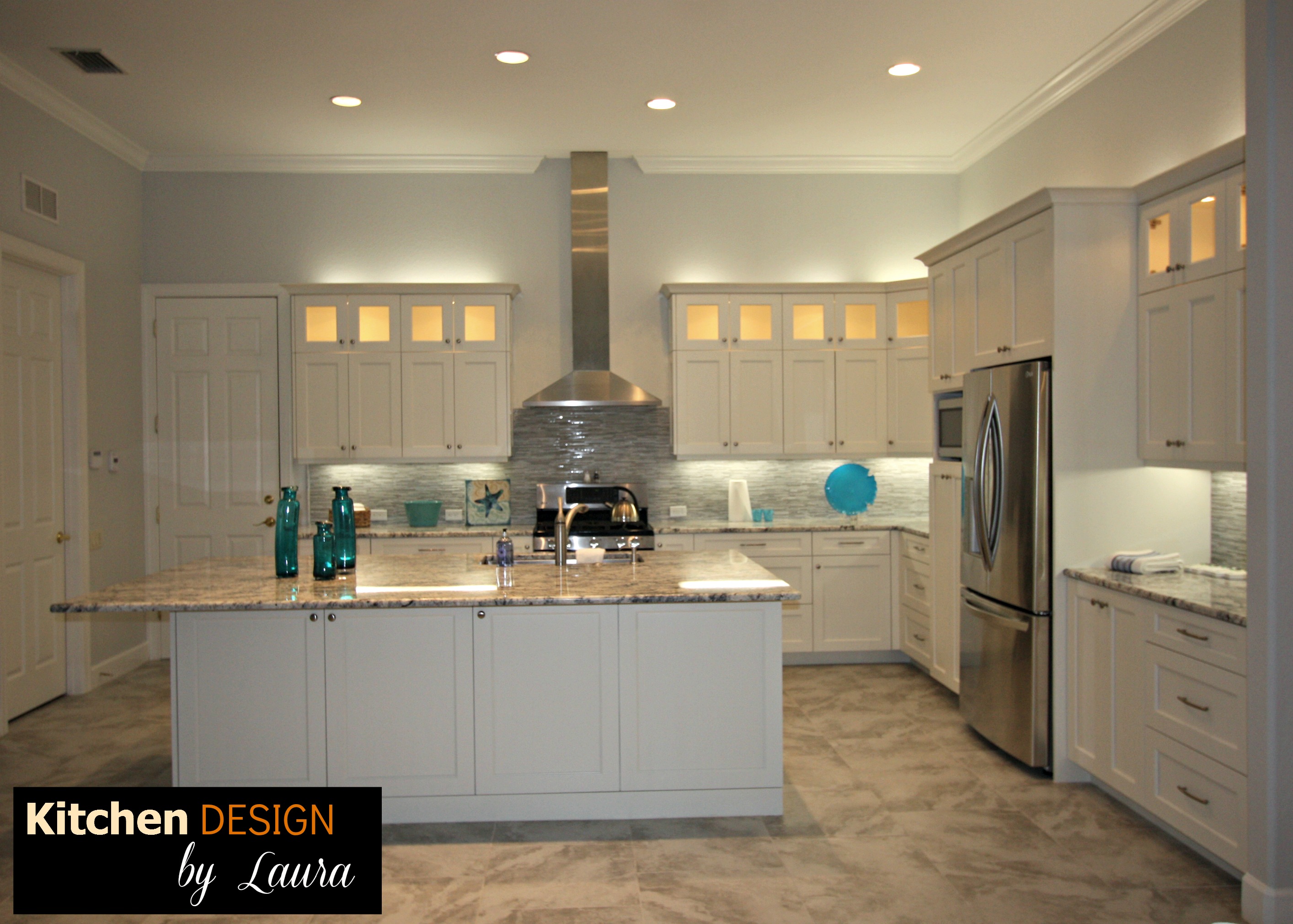Bradenton Kitchen Renovation / White Cabinets with Large Kitchen Island